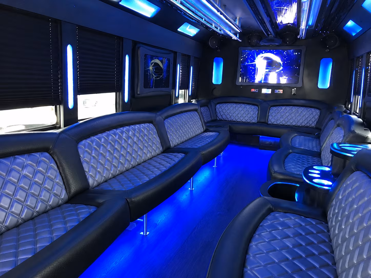 Group beside a Mercedes Sprinter limo in Fresno